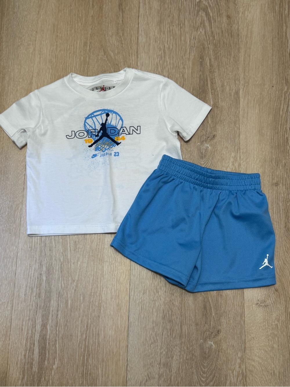Jordan White Graphic Tee with Blue Jumpman Shorts